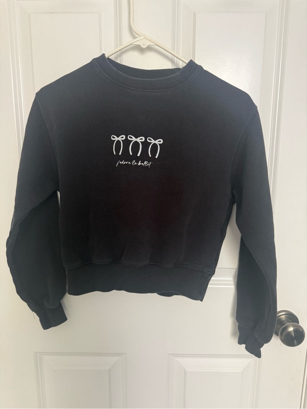 Zara Black Crewneck Sweatshirt with White Bow Motif